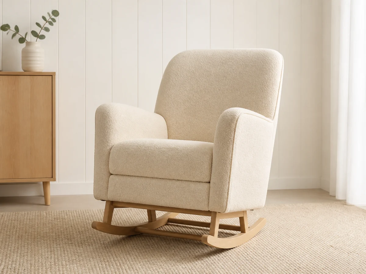 Unbranded upholstered nursing chair in a calm nursery corner