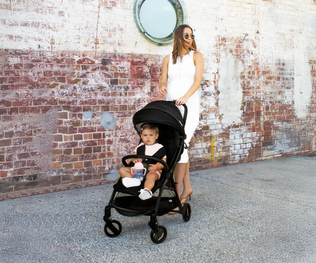 Air Compact stroller shown from the side with its canopy extended