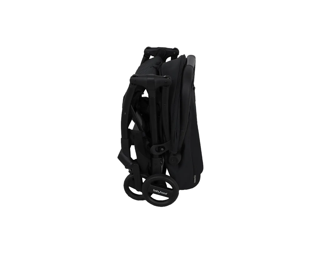 Folded Babyhood Air Compact stroller beside its travel bag