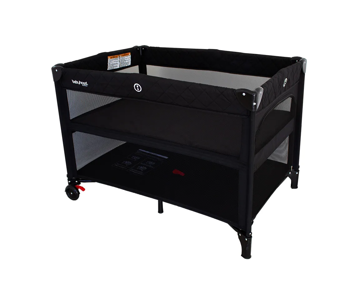 Black Babyhood Bambino Dormire porta cot with its raised newborn bassinet installed