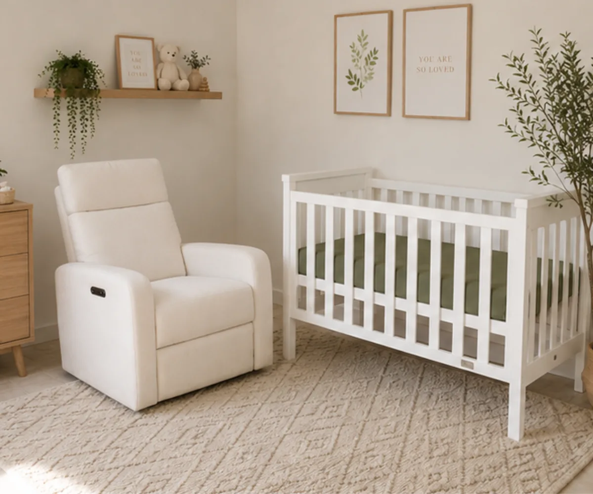 Natural timber Babyhood Milano Cot shown from the side