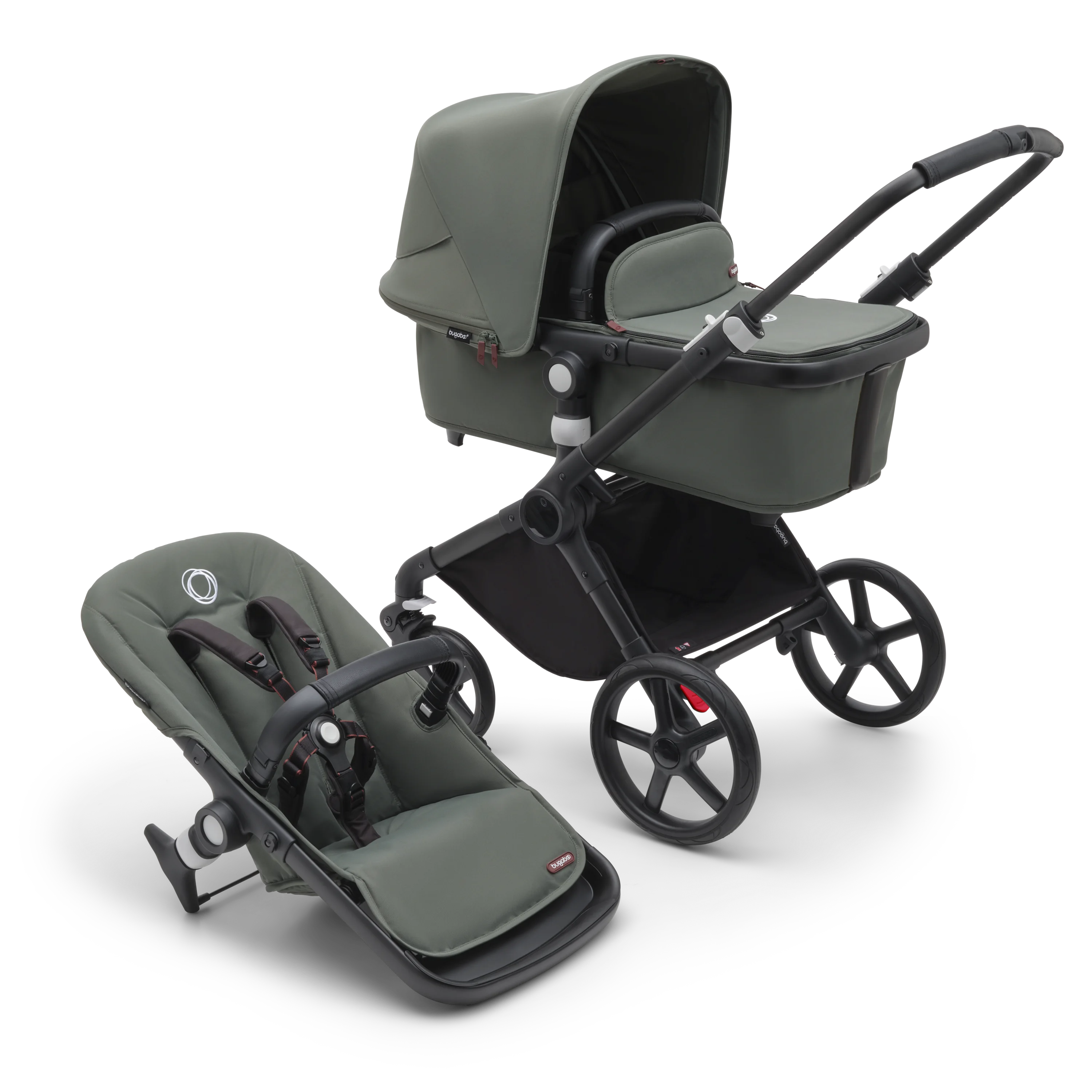Green Bugaboo Fox Cub pram with bassinet and seat