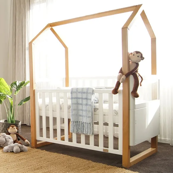 Kaylula Mila Cot with its tall house-shaped timber frame