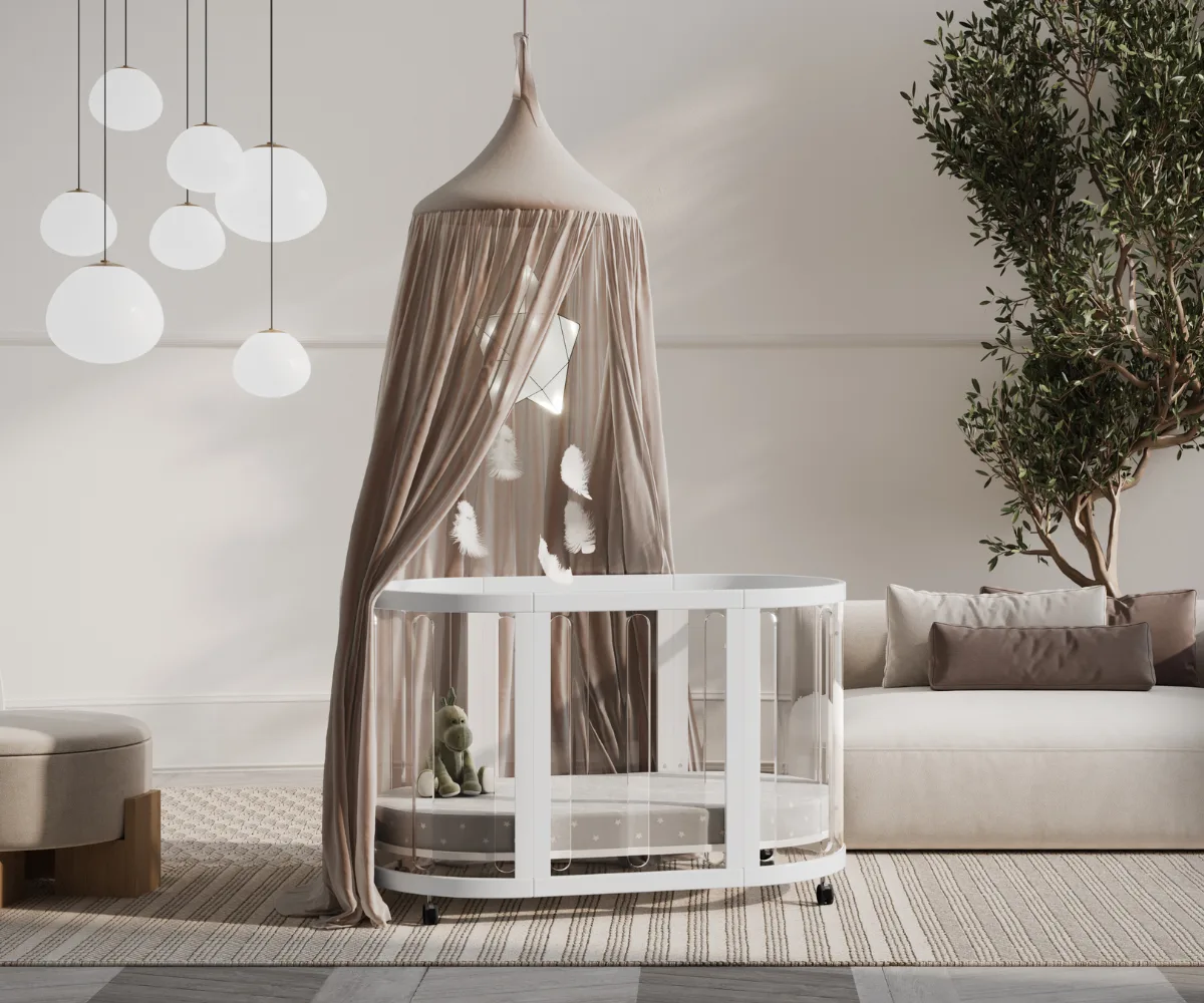 White Kaylula Sova Clear cot in its round bassinet configuration